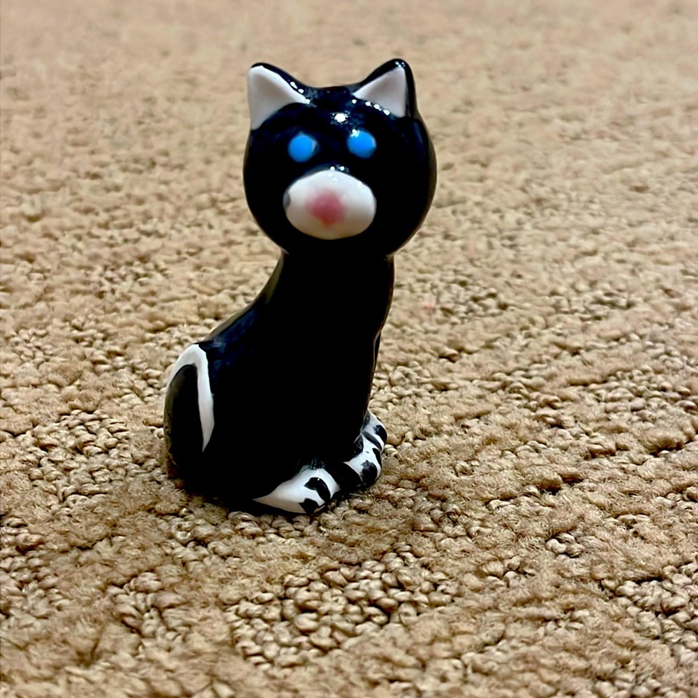 Little black cat antique.